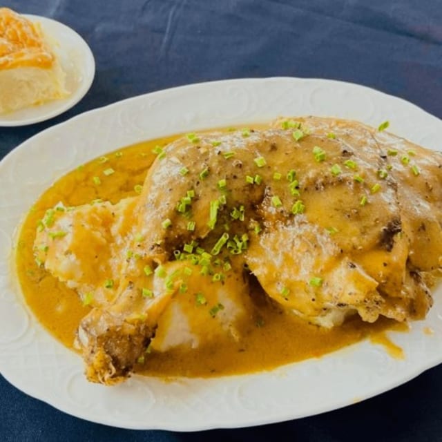 Smothered Baked Chicken with Rice.